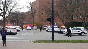 Emergency vehicles rush to the scene on the Ohio State campus.